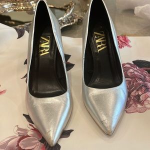 Pair of Zara silver metallic high heel court shoes . Pointed toe. Heel 3inches